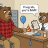 Cartoon bear worker with a wrist support looks puzzled as a clerk bear says Congrats you are MMI beside a report topped with a party hat, illustrating maximum medical improvement in California workers comp